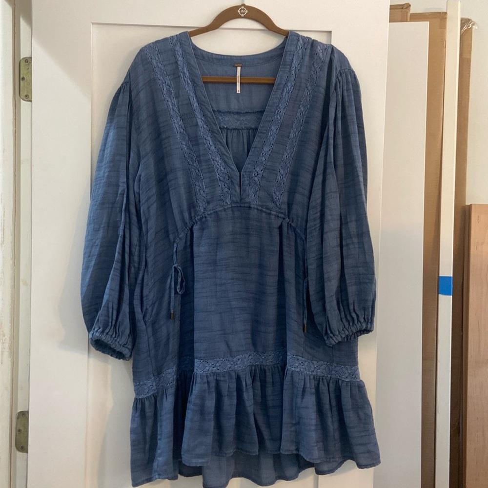 Blue boho dress by Free People in a size medium